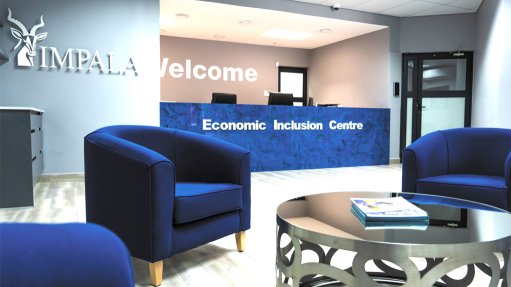 EXTENDING REACH Through an extensive range of education and training initiatives, Impala Platinum Holdings is changing outcomes for mine personnel at all levels, as well as host communities and entrepreneurs