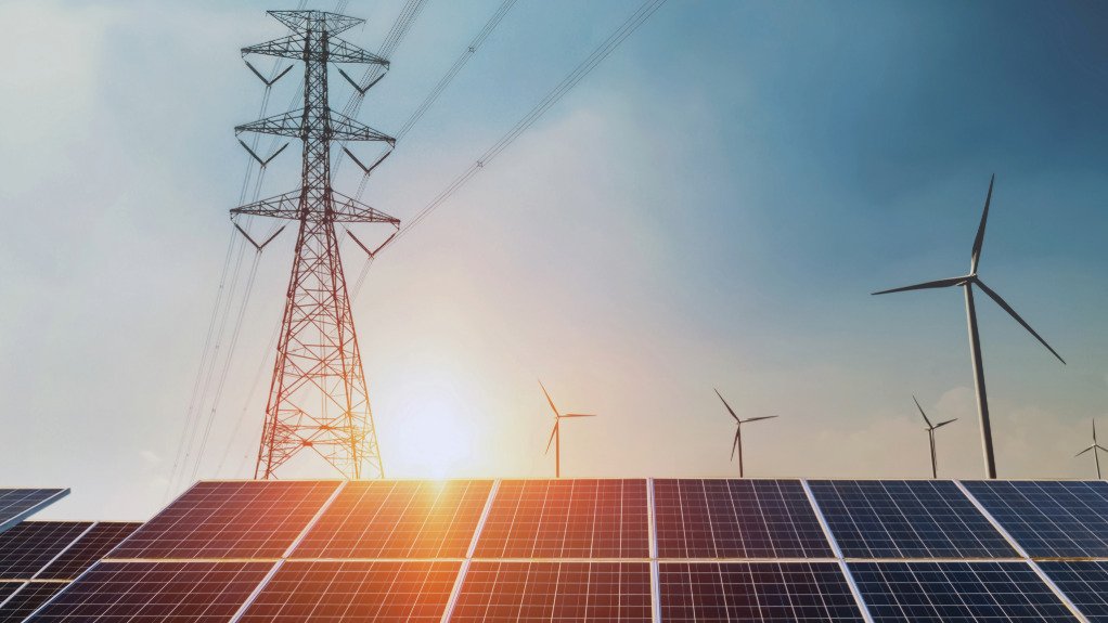 Solar panels and an electricity pylon