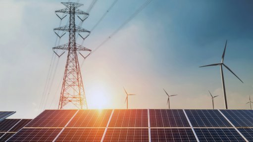Solar panels and an electricity pylon