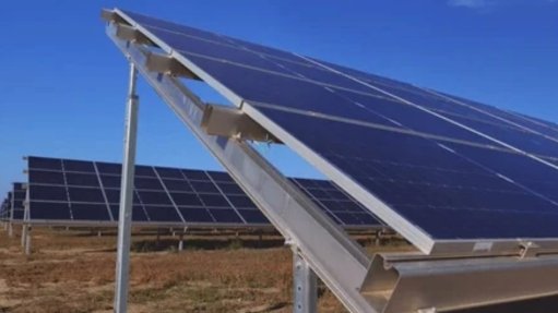 An image of solar panels at a solar farm