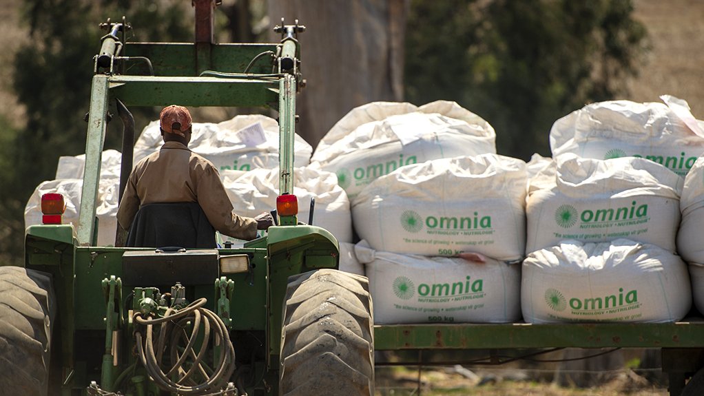 Fertiliser manufactured by Omnia being moved on a farm