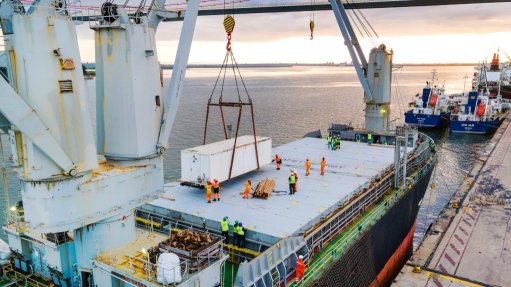 An image of a logistics channel for a ship transporting modular buildings and containers