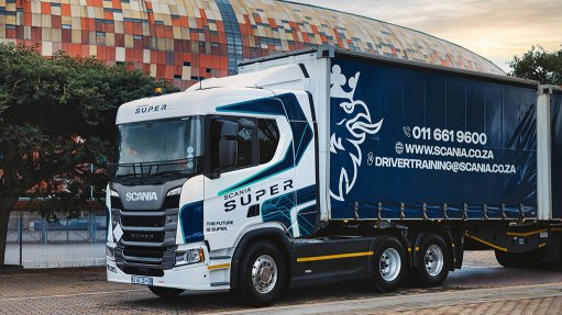 Image of the Scania Super in front of Soccer City stadium

 