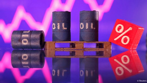 3D printed oil barrels and a percentage symbol