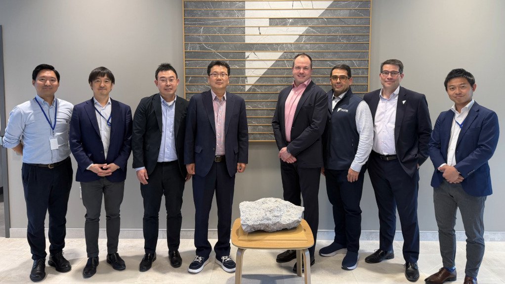 Represenatives from Hanwha and Frontier Lithium at a visit to Frontier's offices are (from left) Tomotaka Kawabata, Susumu Okabe, Byeong Joong Kim, Woo-young Chang, Trevor Walker, Erick Underwood, Greg Da Re and Takahiro Kume. 