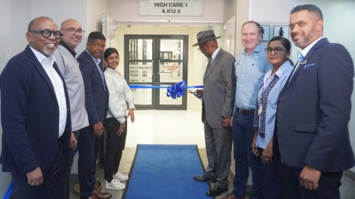 A generic image of industry stakeholders at a hospital ribbon cutting ceremony