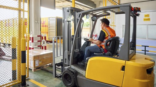 Image of a forklift moving packages