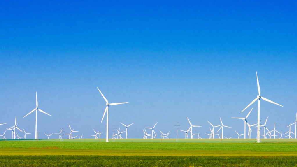 A generic image of windmills in an open field
