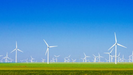 A generic image of windmills in an open field