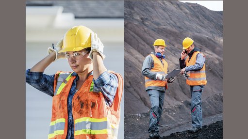 An image of workers on site wearing hard hats and reflective vests