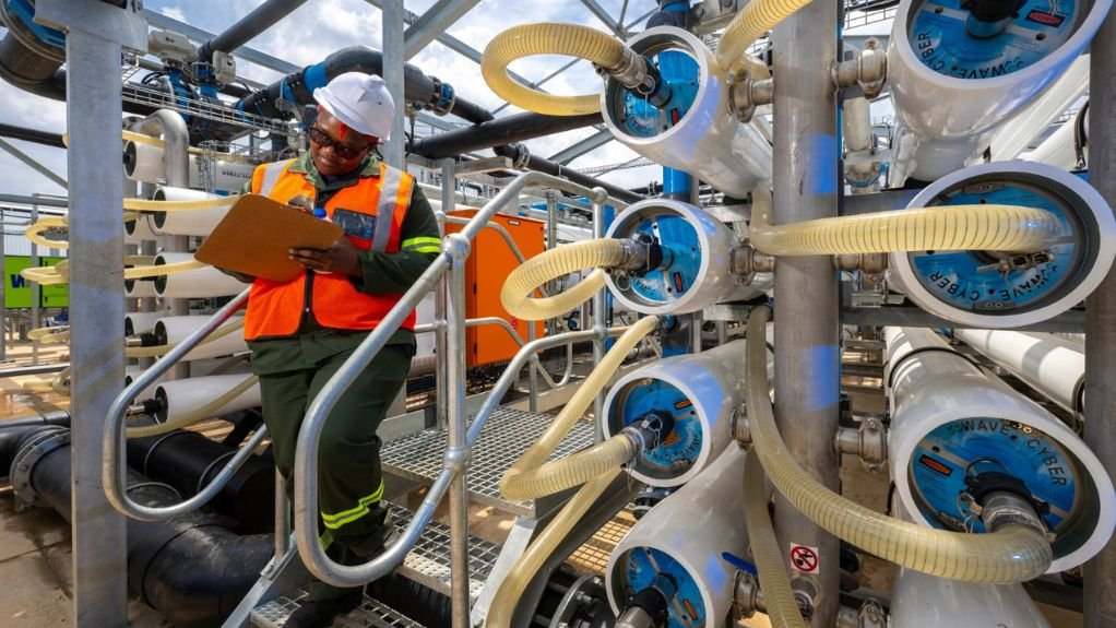 A worker checking the operations on site