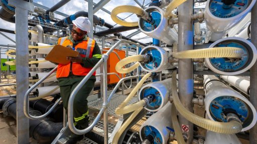 A worker checking the operations on site