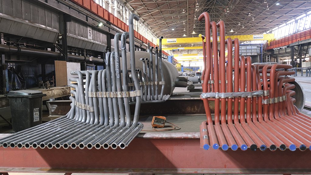 Image of PF pipe fabrication components in a factory