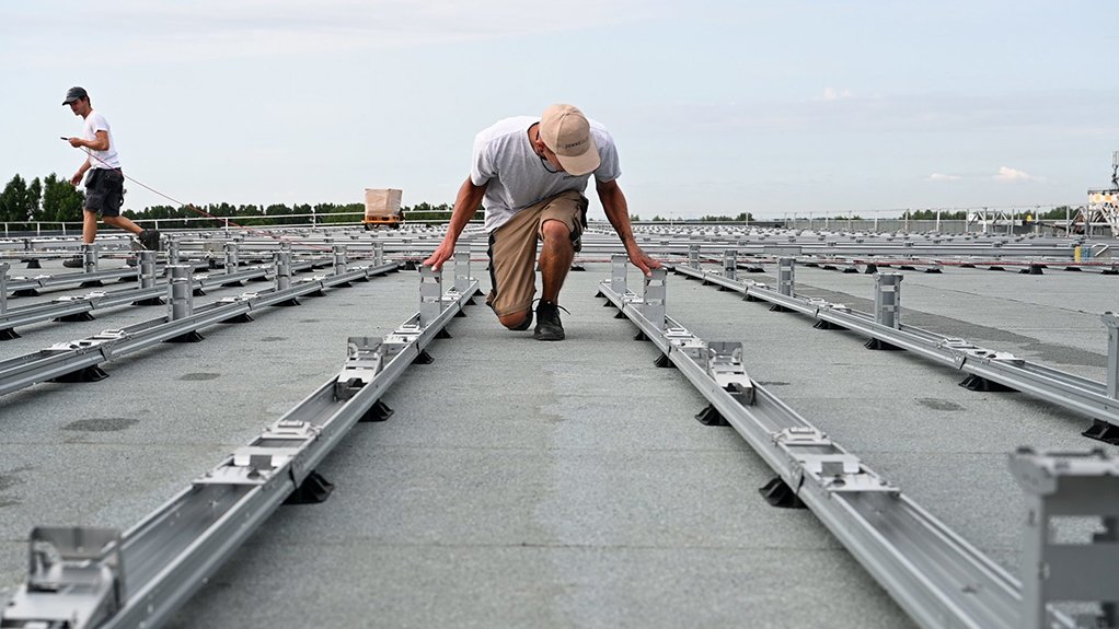 Image of a worker at a solar installation