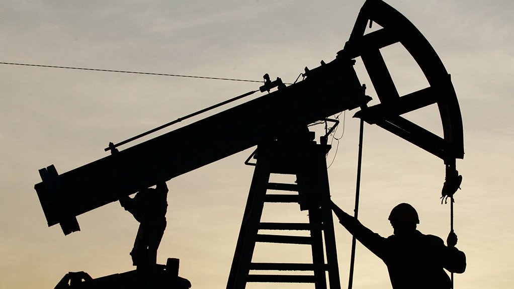 Oil worker on an oil pump