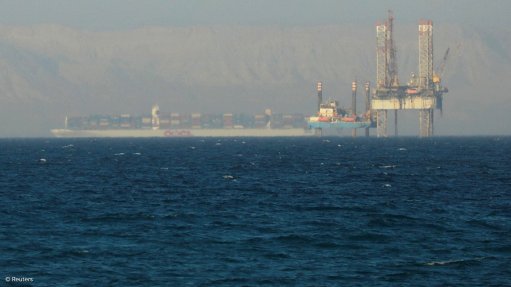 A container ship and oil rig near the Suez Canal