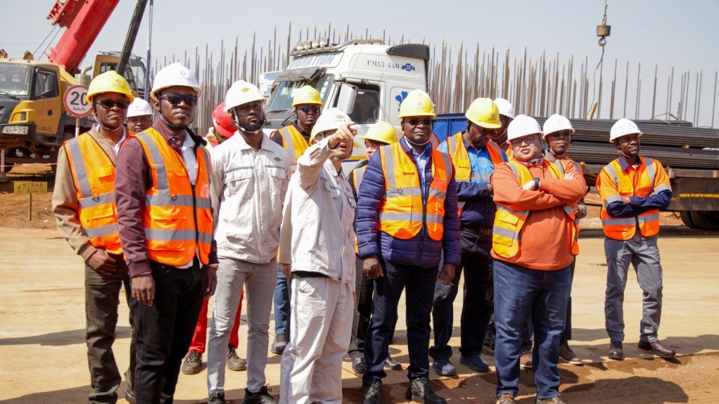 An image of the ZCC-IH team touring the Mono Ammonium Phosphate (MAP) fertiliser plant construction site