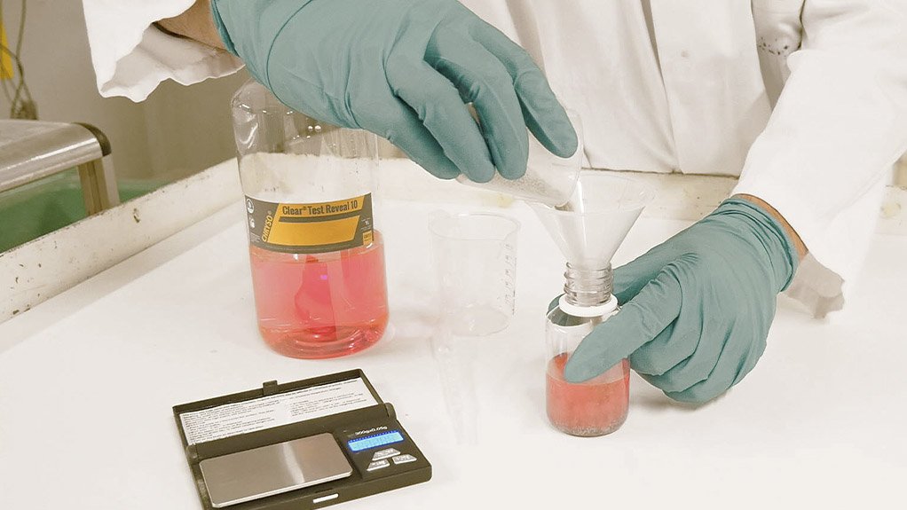 Image of a laboratory worker using the Chryso Clear test