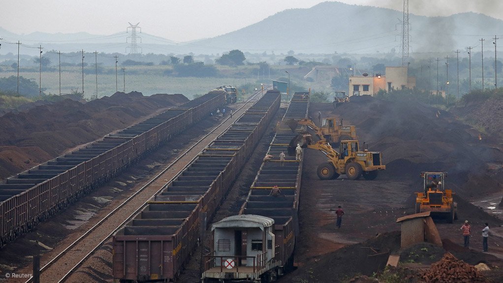 Freight trains being loaded with iron-ore in India