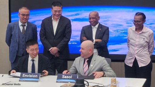 Representatives from Envision and Sasol, including industrial and economic policy specialist Jak Koseff (front right), signing an agreement in the presence of South Africa's Electricity and Energy Minister Dr Kgosientsho Ramokgopa