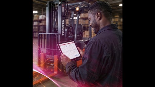 Image of a person using I Site telematics platform on a smart tablet