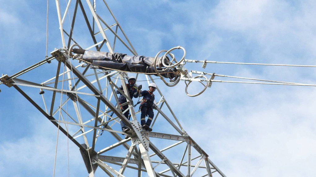 NTCSA employees building power pylons