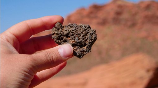 Bauxite ore in hand