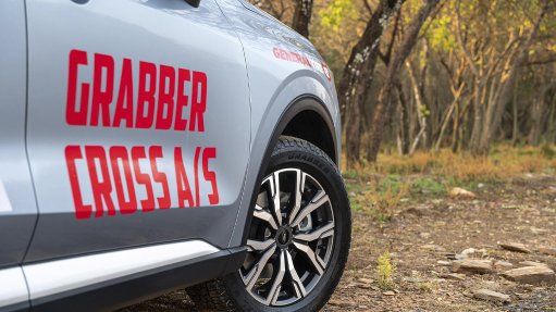 Image of a sedan fitted with a Grabber Cross A/S tyre range