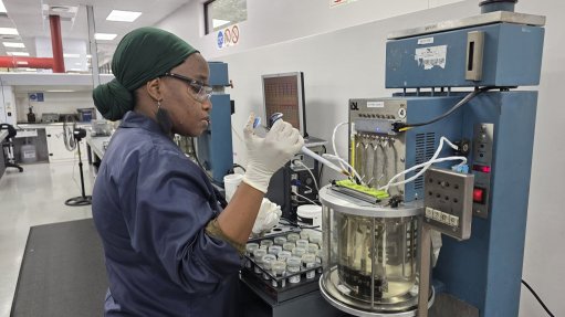 UPPING PRODUCTIVITYWearCheck monitors the condition of critical assets while they remain in service, to boost lifespan and enhance productivity. Here, laboratory technician Nellie Thabethe prepares used oil samples for scientific analysis