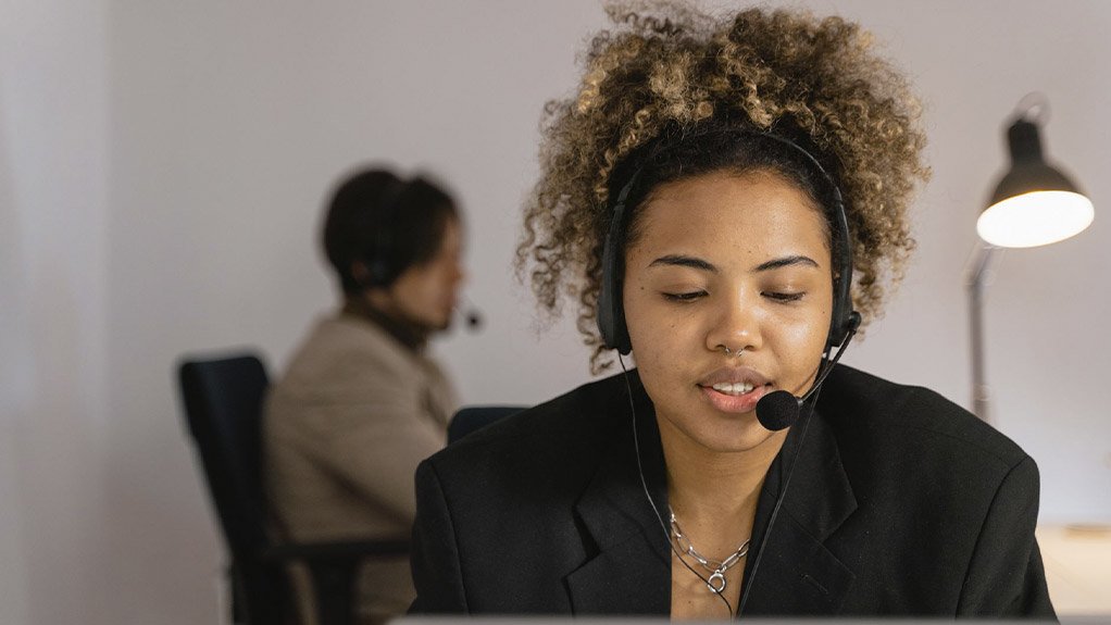 Person wearing a telephone headset