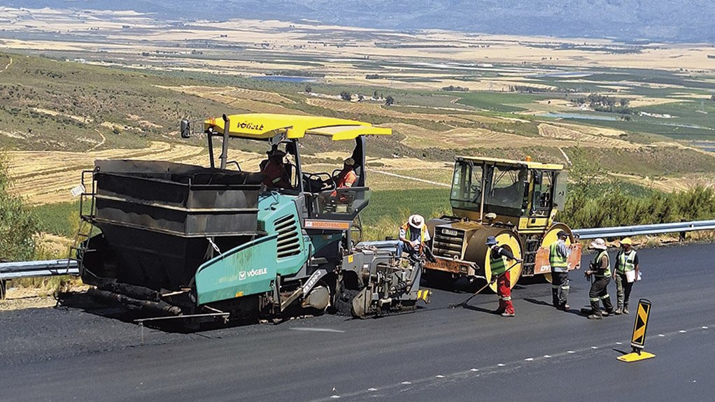 Image of a contractor undertaking road maintenance