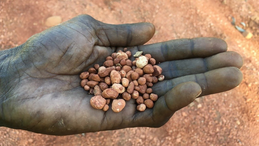 Bauxite in hand