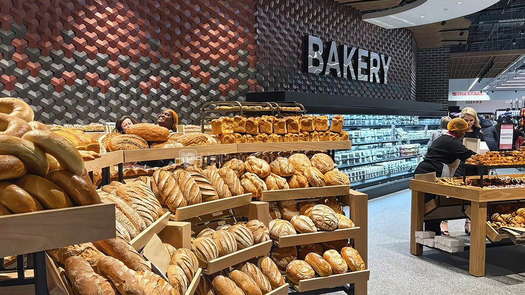 The bakery wall at SPAR in George is treated as an architectural feature in its own right. EQUAL 3D concrete tiles establish a bold geometric pattern, while Gunmetal Grey finishes and copper metallic accents add warmth, visual depth and a distinctive identity to the space