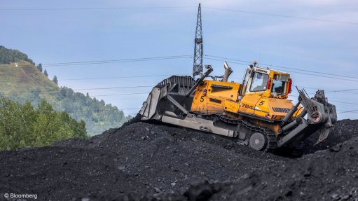 Truck on coal heap