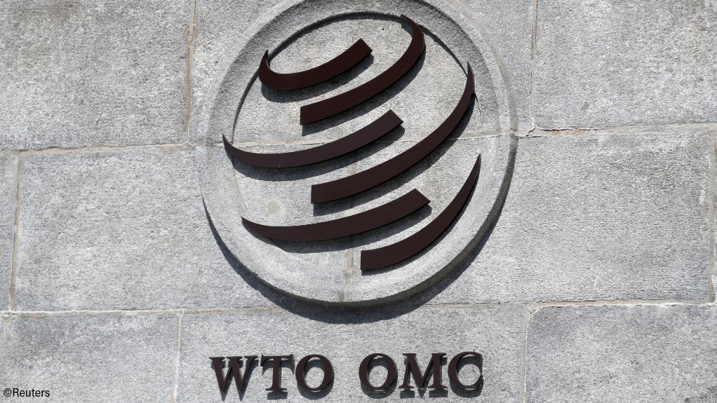The WTO logo on a wall