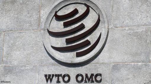 The WTO logo on a wall