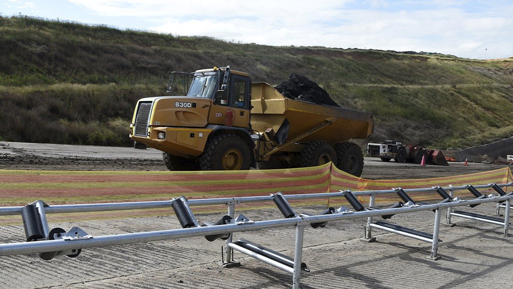 Ore handling systems, including articulated dump trucks (ADTs), LHD cleaning operations and temporary conveyor structures