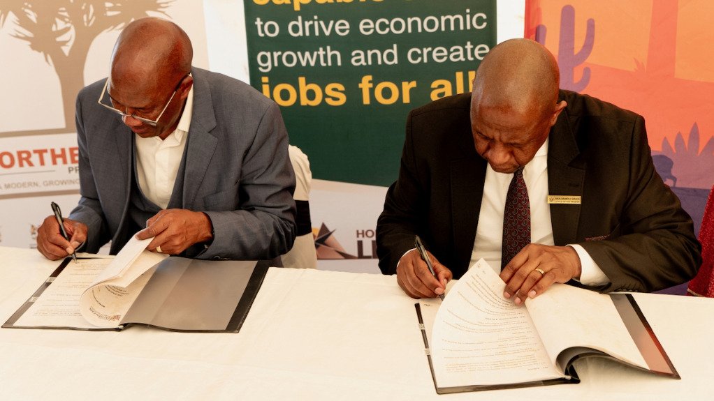 Northern Cape Office of the Premier director-general Advocate Justice Bekebeke (left) and Eastern Cape Office of the Premier acting director-general Mr Mahlubandile Qwase signing the MoU