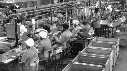 An image of workers in a factory