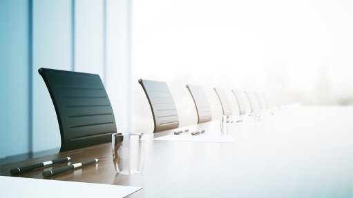 Desk and chairs in a boardroom