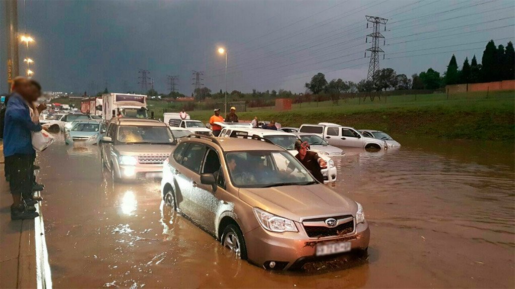 Cards driving on a flooded road