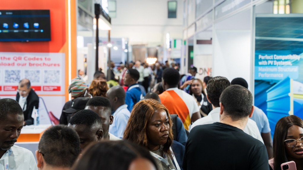 The above image depicts a crowd of people at the Saudi Warehousing & Logistics Expo