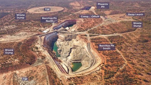 Image looking north showing historical pits, rehabilitated leach pads and waste dumps, tailings storage facility and exploration camp