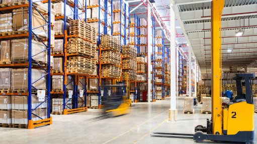 The above image depicts workers in a warehouse