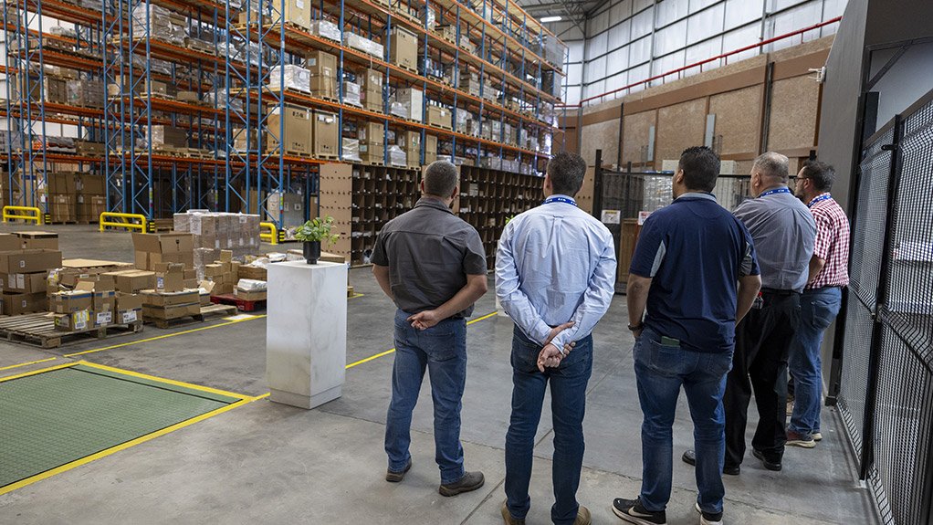 Image of people inside a warehouse
