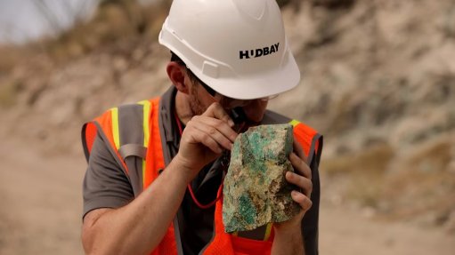 Hudbay employee with copper ore