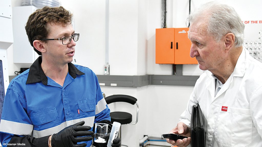 A flashback to Rainbow's Roux Wildenboer (left) and Mining Weekly's Martin Creamer at the lab at Mintek.