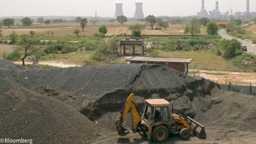 Coal mine in India with power station in background