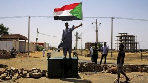 Sudan security forces fire tear gas at protesters on anniversary of political power-sharing deal
