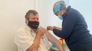 Harmony CEO Peter Steenkamp receiving his Covid-19 vaccination at the Medscheme Health Facility in Florida, Roodepoort.